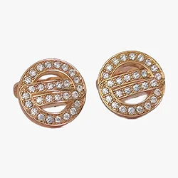 Round golden cufflink with rhinestones