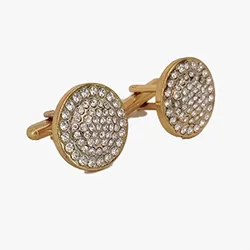 Round rhinestone cufflinks in golden color